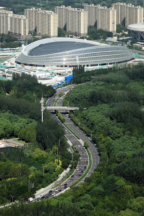 北京冬奥会场馆之一首都体育馆修建于哪一年，首都体育馆冬奥会项目？